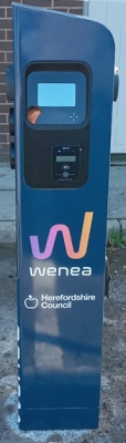WENEA charge point for electric vehicle, with Herefordshire Council branding