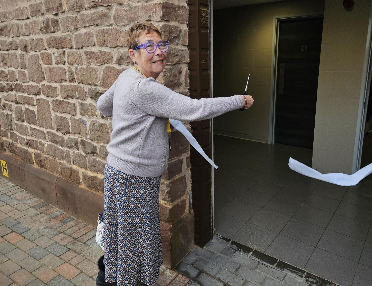 Councillor Carole Gandy opening the Maylord Orchards toilet