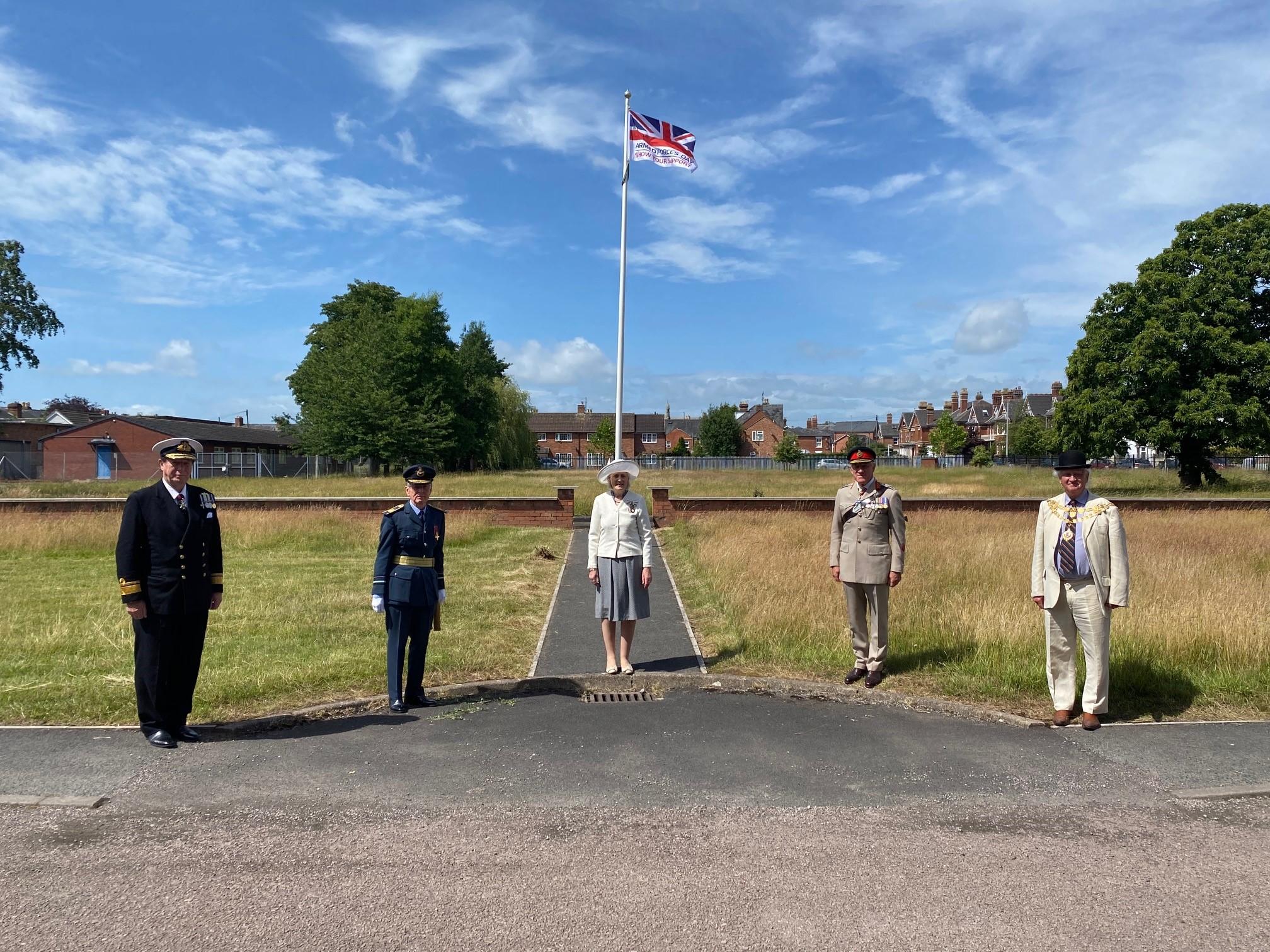 A flay is raised for Armed forces day at Sulva barracks in Hereford pictures with the flag at full mast Rear Admiral Philip Wilcocks, Air Vice-Marshal Mike Smart, Her Majesty's Lord Lieutenant of Herefordshire The Dowager Countess of Darnley, Major-General Arthur Denaro, Councillor Sebastian Bowen