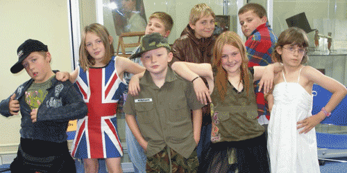 Image of children dressed in costumes from 1948 to 1990s