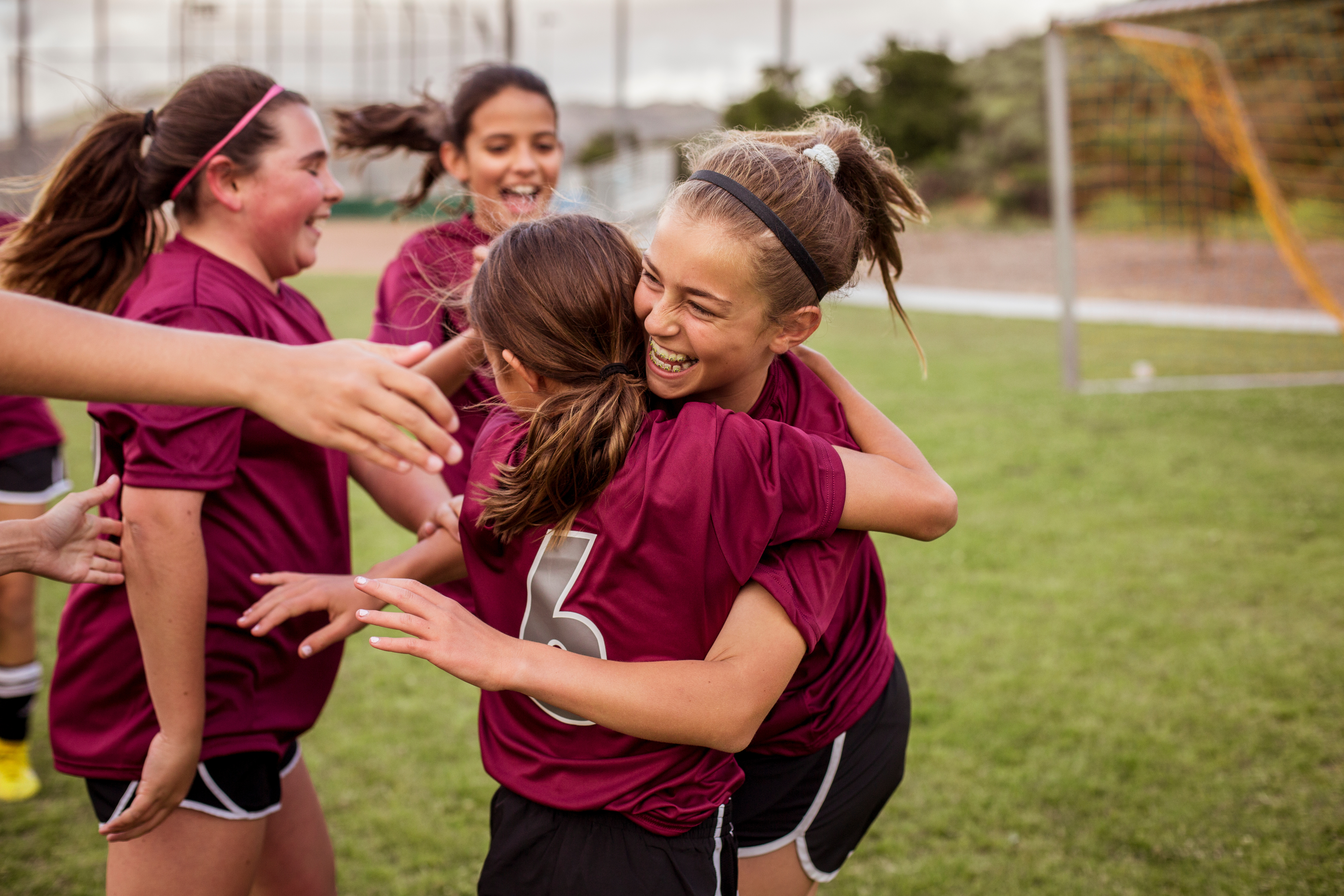 Girls celebrating after sporting success