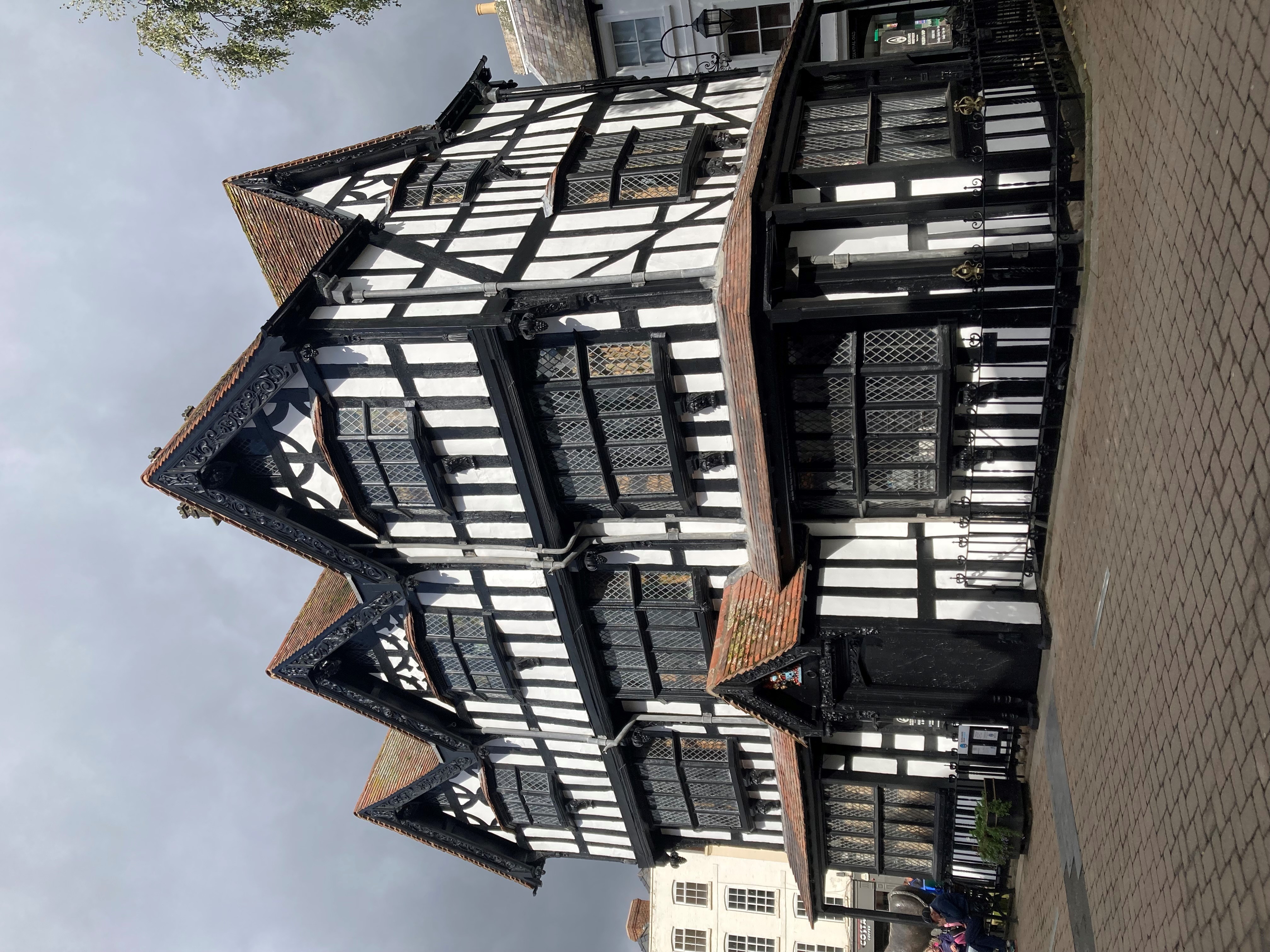 Specialist conservation work on the exterior of the iconic Black and White House Museum in Hereford has been completed a month ahead of schedule.