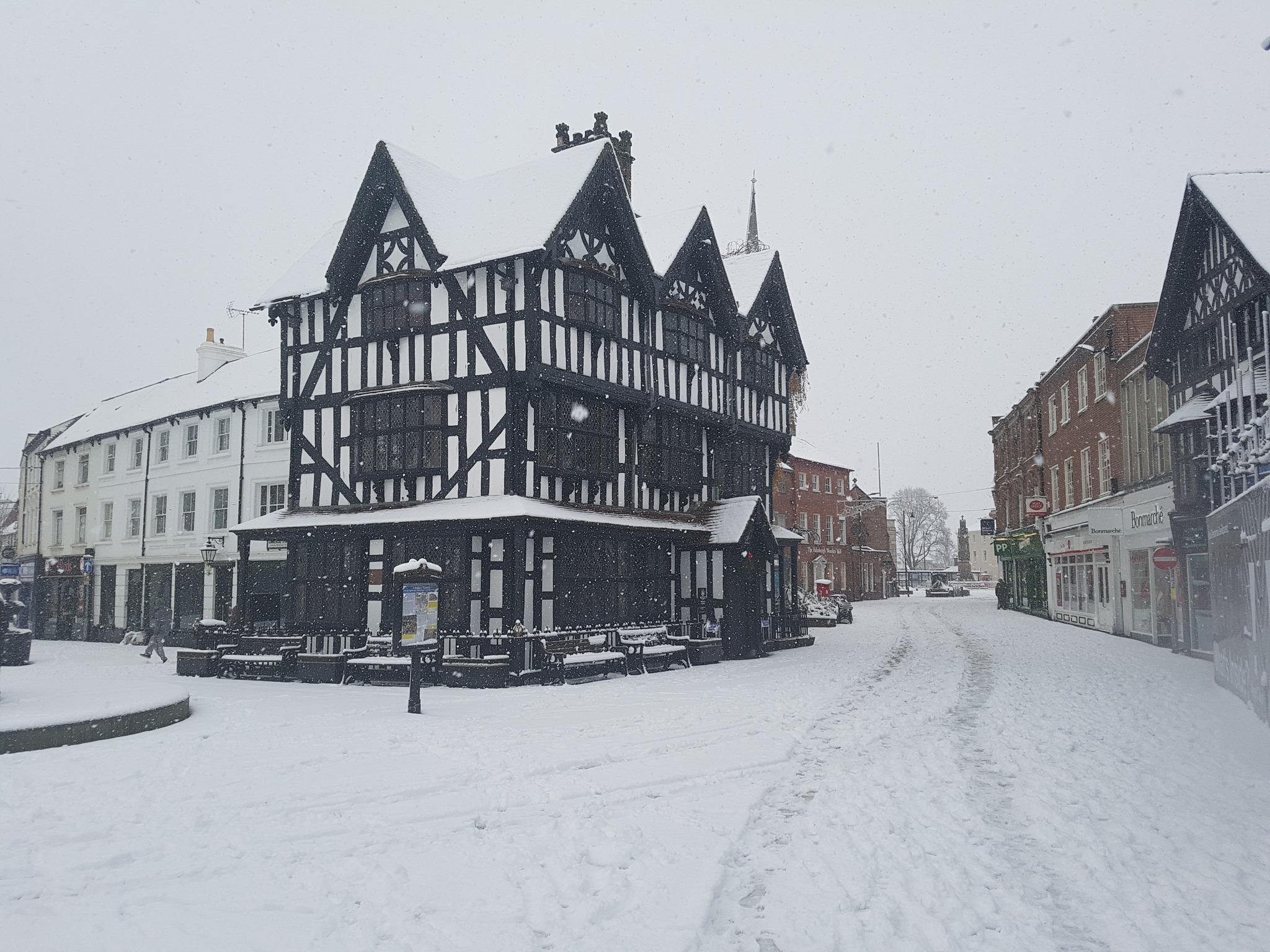 Black and white house Museum in the snow