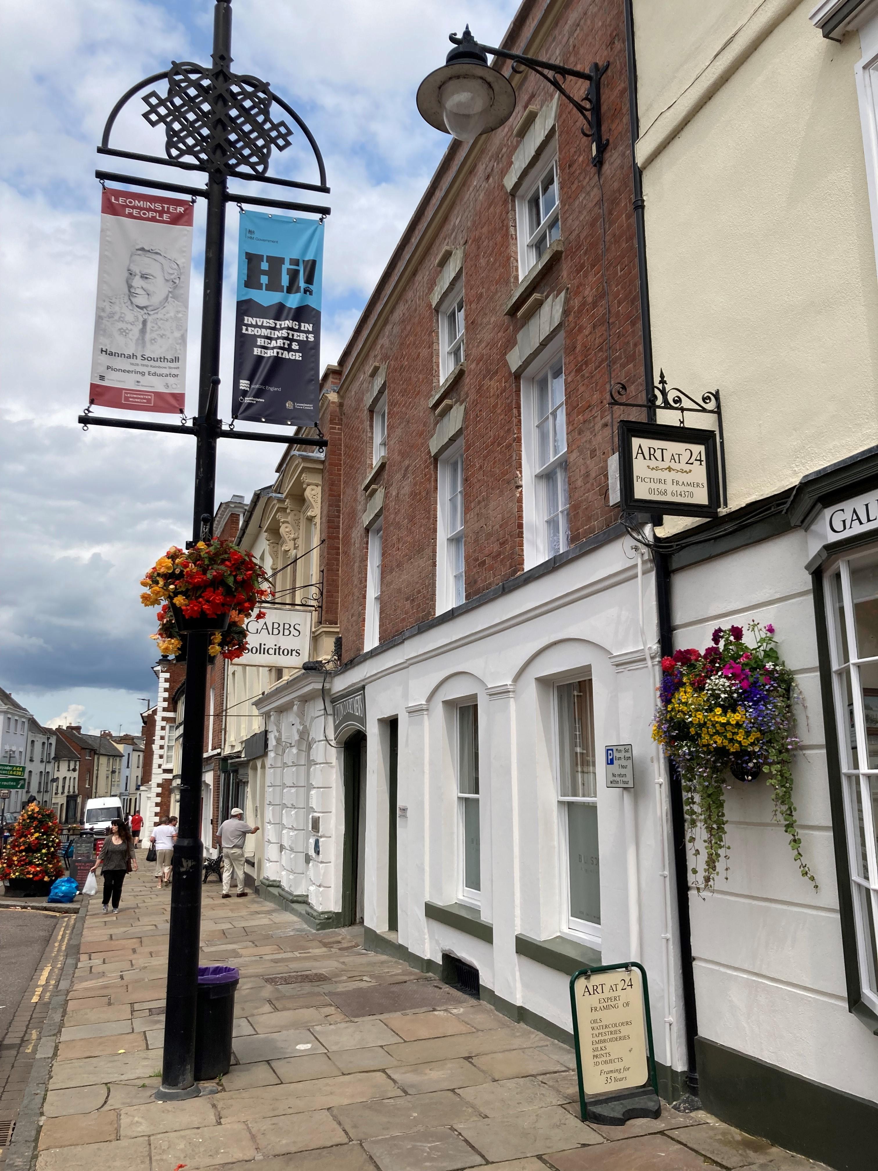Looking up Broad street in  Leominster showing Art at 24 shop sign