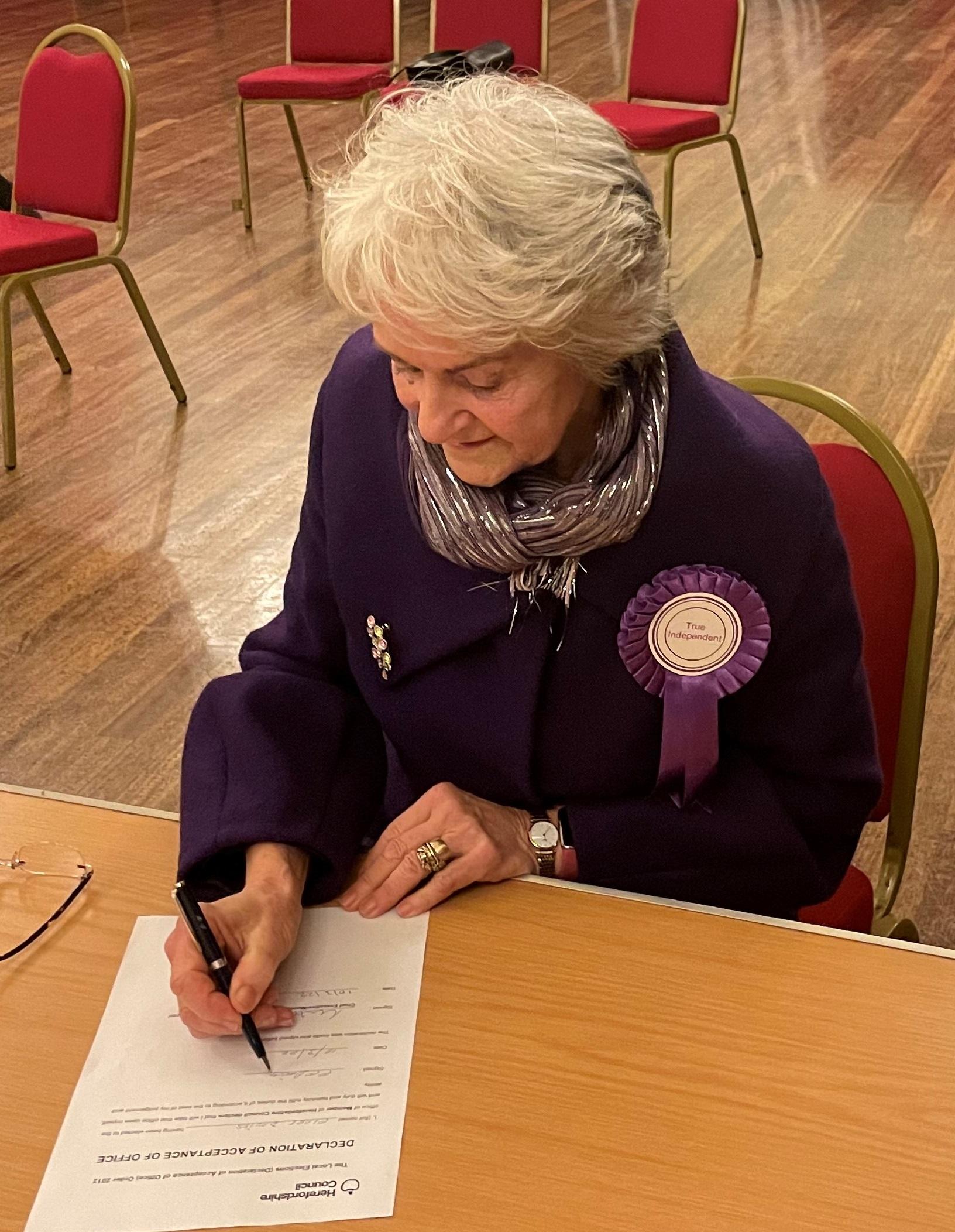 Cllr Claire Davies signing to accept being elected to represent Bromyard West Ward March 2022