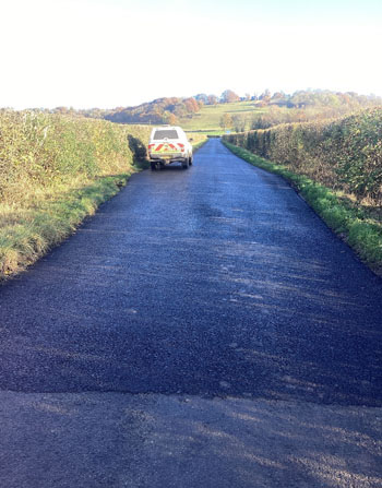Stretch of the C1154 with resurfacing/surface dressing repairs