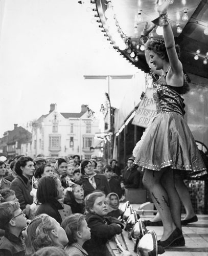 Derek Evans image of show girls dancing at May Fair