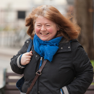 woman walking through town