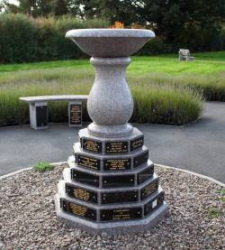 Granite birdbath memorial with granite plaque