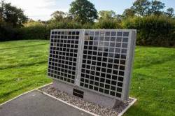 Granite book memorial with granite plaque