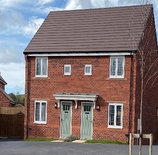 Semi-detached houses at Holmer House Farm