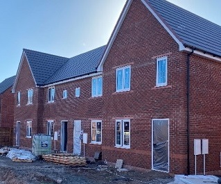 Terraced properties being built at Holmer West development