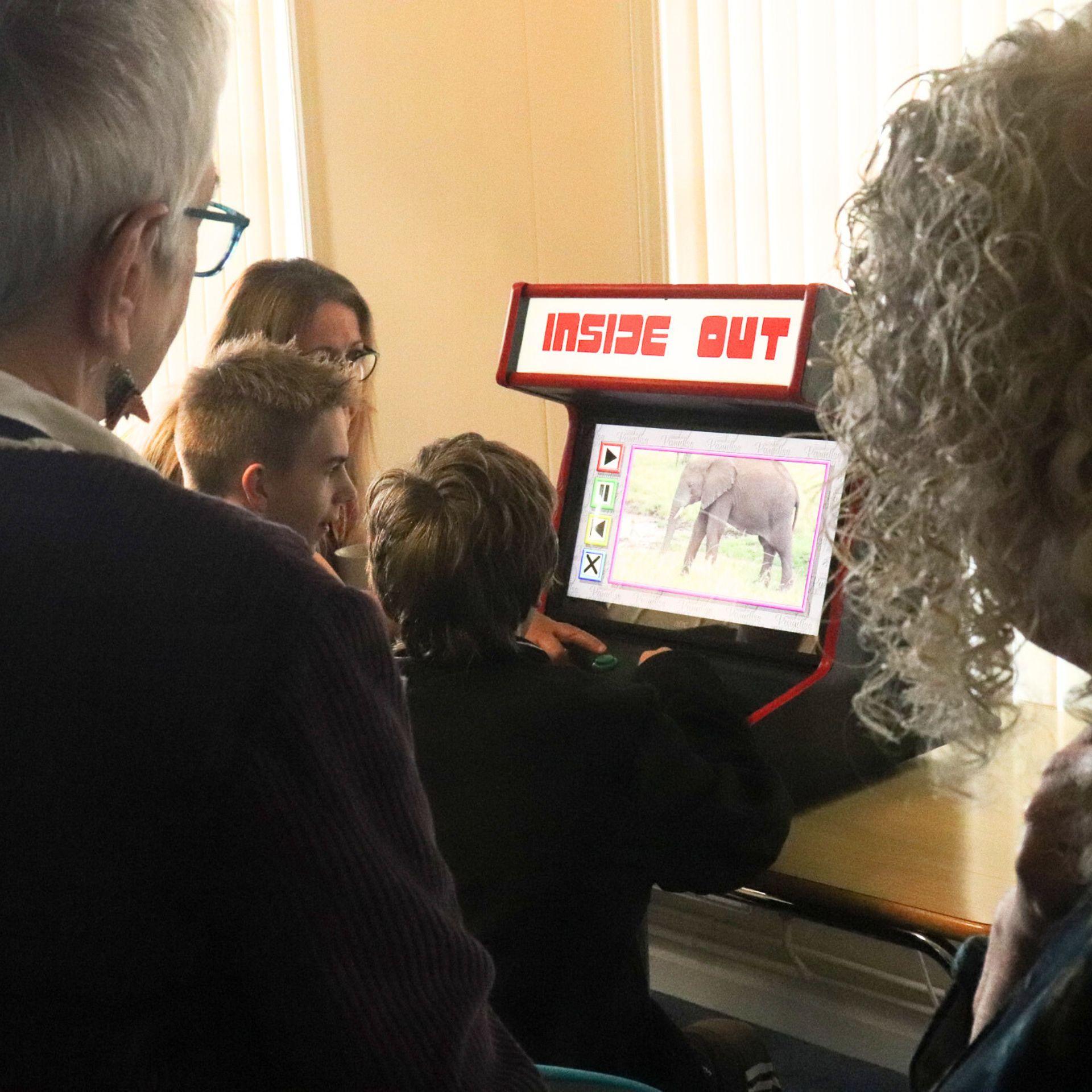 Hilary Hall and Councillor Jenny Bartlett Watching the Noah's ark retro game in progress
