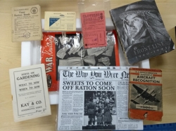 Collection of WW2 paper memorabilia, including ration book, maps etc