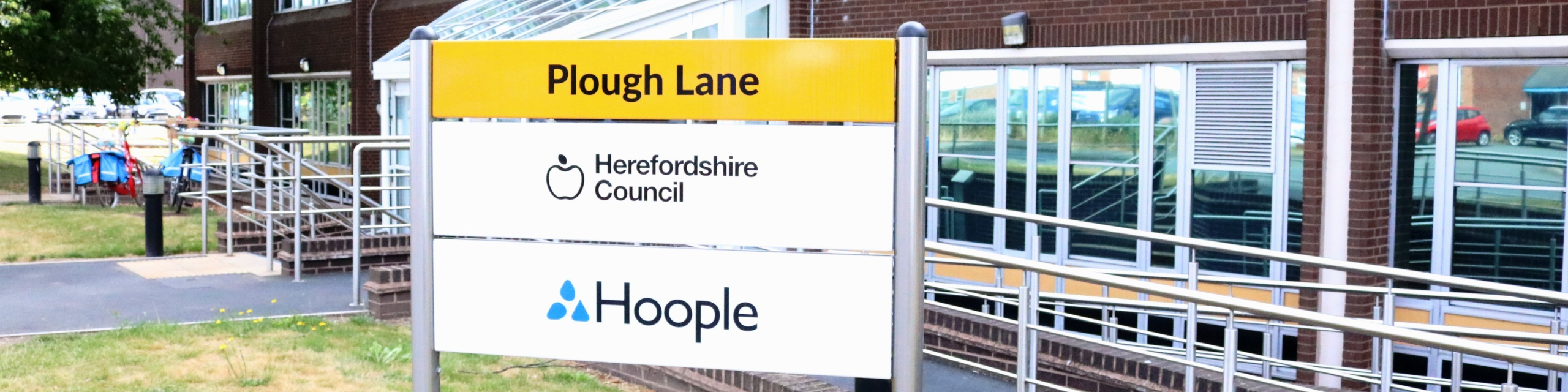 Sign which says Herefordshire Council outside the council&#039;s Plough Lane office