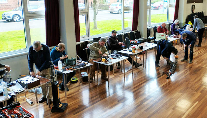 Volunteers working at Ledbury repair cafe