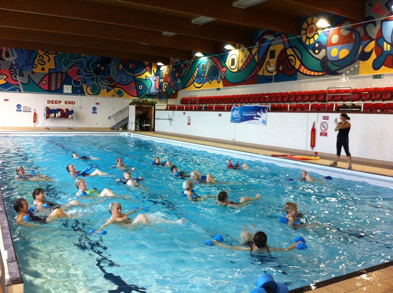 People enjoying a swim in Ross swimming pool