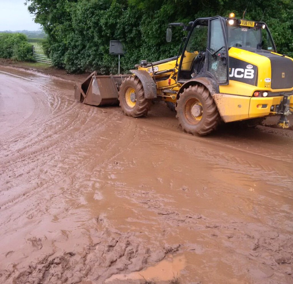 Soil water run off on a road caused by flooding