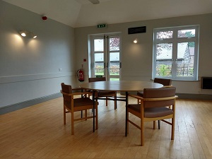 Table and chairs set up at Brockhampton Village Hall