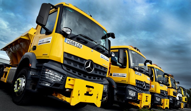 Row of gritter lorries