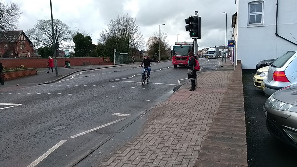 Cyclist and lorry on an urban road