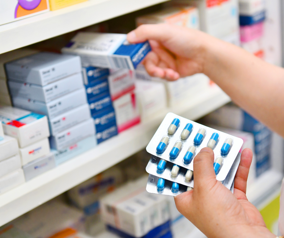 Stock image of pharmacist picking medicines