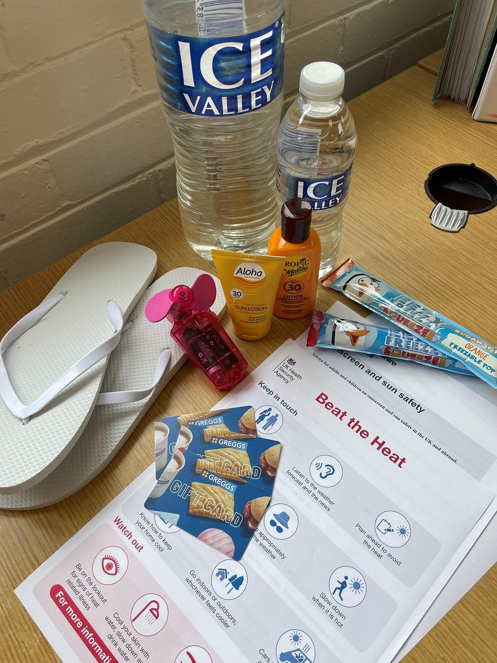 Healthpack contains icepops, water, hand held fan, flip flops, sun cream, Greggs gift card and health advice