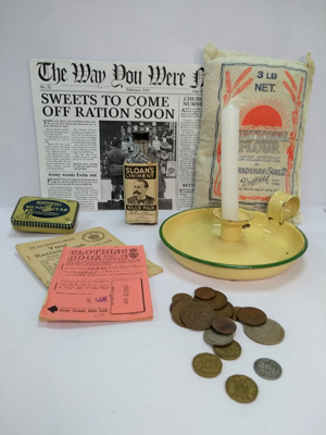 Items from the Home Front, WW2, old newspaper, ration book