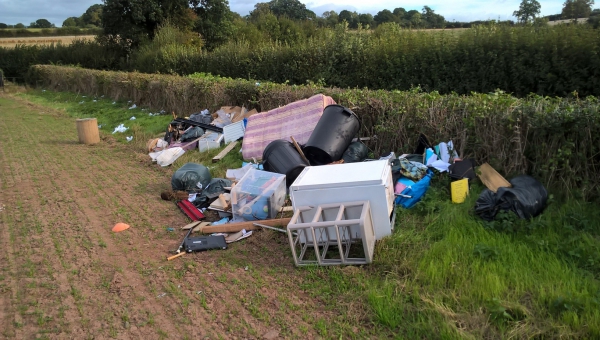 Photo of waste fly tipped in a Clehonger field
